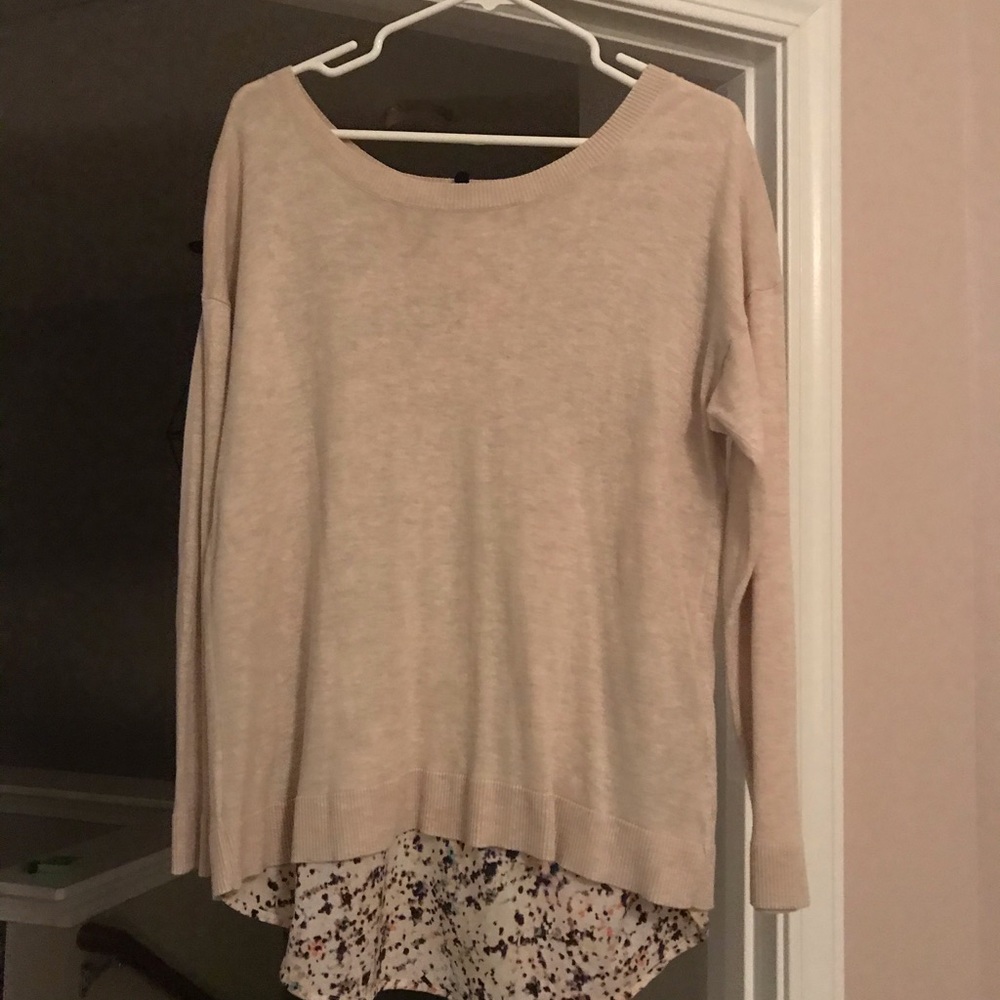 Women’s sweater with underlay through open back